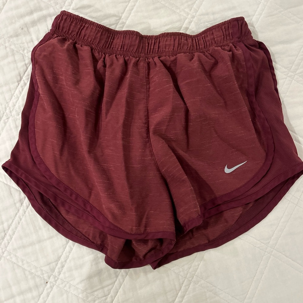 Nike. Women’s small, burgundy running shorts.